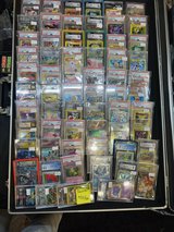 Pokemon TCG graded slabs and raw vintage singles - card show case in Riverside, California