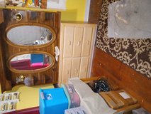 Beautiful dresser with mirror sits on top in Moody AFB, Georgia