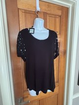 New DKNY Size Large Black Top with Star print Sheer Short Sleeves- in Naperville, Illinois