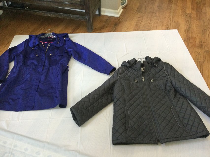 Two Women’s Coats in Aurora