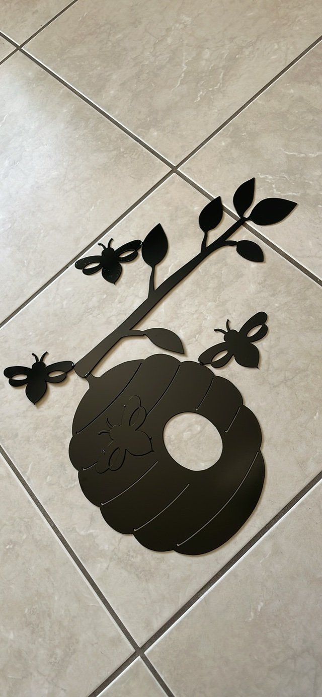 metal honey bee sign in 29 Palms